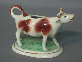 A Staffordshire cow creamer 4"