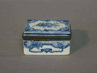 An 18th/19th Century Delft trinket box with hinged lid and blue and white decoration, the base monogrammed PK? 3 1/2"