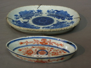 An Imari boat shaped dish 6" and an Oriental blue and white oval dish 8"