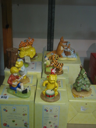9 various Royal Doulton Winnie The Pooh figures - Most Perfect Tree, A Little Tree Trimming, Bounce Bounce Boo to You, A Little Clean Roo is Best, Its Honey All The Way Down, Rum Tum Tum Winnie on his Drum, Happy Christmas Piglet, Christopher Robin Strums a Melody and Sleepy Day in 100 Acre Wood