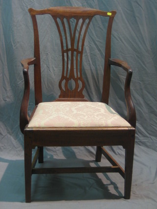A 19th Century Chippendale style mahogany carver chair with vase shaped slat back and upholstered drop in seat