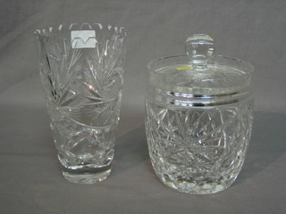 A circular cylindrical cut glass vase 7" and a do. biscuit barrel 5"
