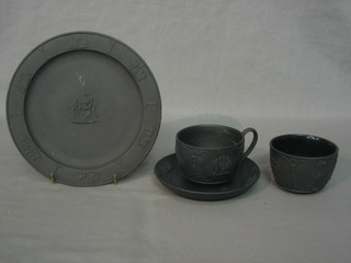 A  19th Century Wedgwood black basalt 12 piece tea service with 2 circular plates 8", tea bowl 3", 6 saucers and 3 cups, bases marked Wedgwood T