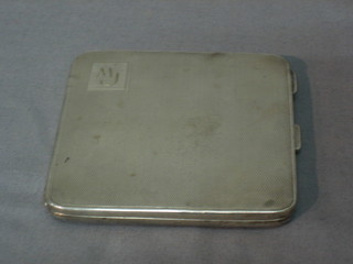 A silver cigarette case with engine turned decoration London 1932, 3 ozs