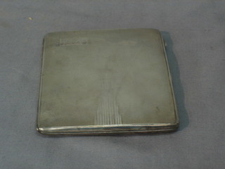A silver cigarette case with engine turned decoration Birmingham 1935, 4 ozs