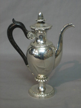 A Continental silver Georgian style chocolate/coffee pot, raised on a circular spreading base, 8 ozs