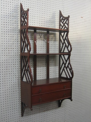 A 19th Century mahogany 3 tier hanging wall shelf with fret work decoration to the side, the base fitted 2 long drawers 17"