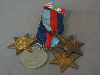 2 1939-45 Stars, an Italy Star and a WWII British War medal