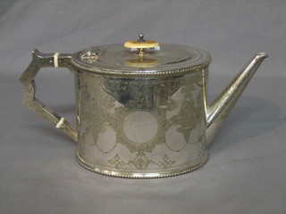 An oval engraved silver plated teapot