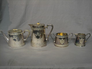 A 4 piece oval silver plated tea service with teapot, twin handled sugar bowl, milk jug and hotwater jut