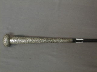 A Victorian umbrella with embossed silver handle, marked St Avits Sutton