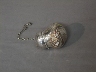 An Eastern Sterling silver nut shaped jar and cover with hinged lid