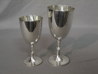 2 silver plated goblets and a silver plated 7 bar toast rack