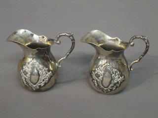 2 small Continental silver jugs 2"
