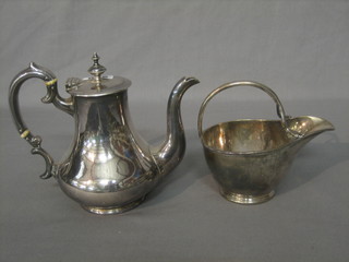 A silver plated coffee pot and a silver plated cream jug