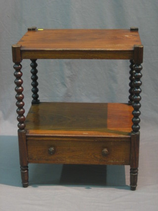 A Victorian rosewood 2 tier what-not, raised on bobbin turned supports, the base fitted a drawer 20"