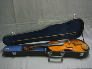 A childs violin with 2 piece back 14" complete with carrying case