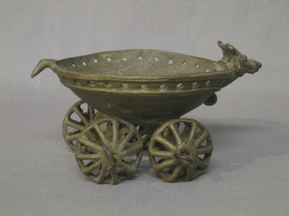 An Eastern bronze ornament in the form of a cart decorated a bulls head 5"