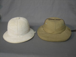 A lady's Pith helmet and 1 other