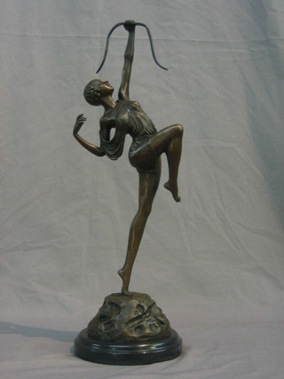 A reproduction bronze Art Deco style figure of a standing lady with arrow, raised on a marble base 19"
