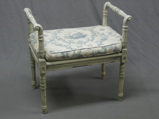 A Regency style blue painted window seat with woven rush seat and fluted decoration