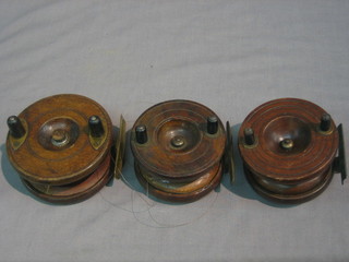 3 various mahogany and brass centre pin fishing reels