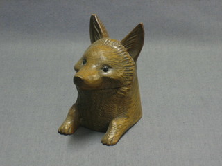 A carved wooden ink well in the form of a foxes mask 4"
