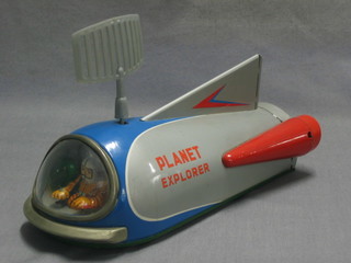 A tin plate battery operated model Planet Explorer Space Ship 10"