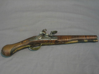 A flintlock pistol with 9" circular barrel and replacement ram rod