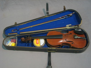 A violin with 2 piece back 13 1/2" together with 2 bows and contained in a wooden carrying case