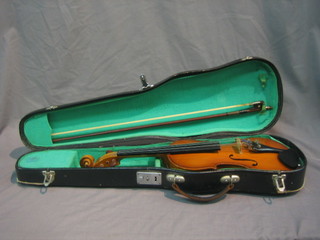 A childs Chinese violin by Lark, with piece back 12", complete with bow and carrying case