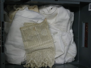 A quantity of various Christening gowns and other items of fabric