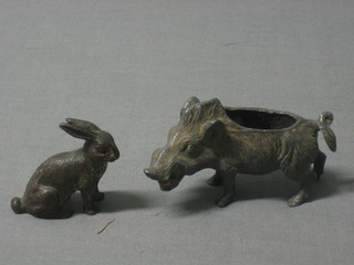 A cold painted bronze figure of a hare together with a spelter pin cushion base in the form of a wild boar