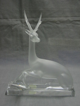 A Lalique model of a seated stag, base with signature to right hand side Lalique France 10"