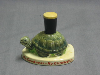 A  Carltonware Guinness figure in the form of a tortoise balancing a pint of Guinness on its shell, base marked My Goodness My Guinness and with red Carltonware mark