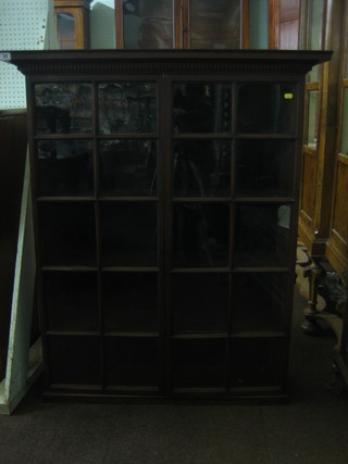 A 19th Century mahogany bookcase top with moulded and dentil cornice, the interior fitted adjustable shelves enclosed by astragal glazed doors 40"