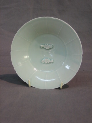 An Oriental dish decorated 2 fish (chip to rim) 6"