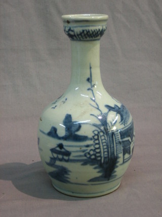 An 18th Century blue and white club shaped vase decorated buildings 8"