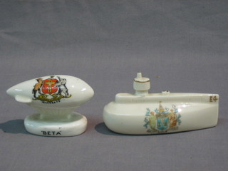 A crested china model of a submarine decorated the arms of Southend 4" and 1 other decorated an air ship 3"