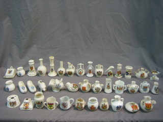 A collection of various items of crested china