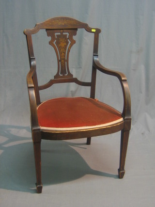 An Edwardian inlaid mahogany open arm chair with pierced vase shaped slat back (f), raised on square tapering supports ending in spade feet (old break to arm)