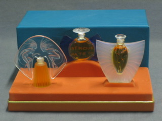 3 Lalique Perfume bottles containing perfume 3", contained in original presentation box