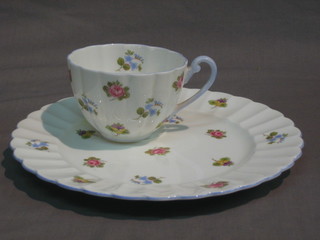 A Shelley tennis plate incorporating a cup, the base marked Rose Pansy Forget-me-Not 13424