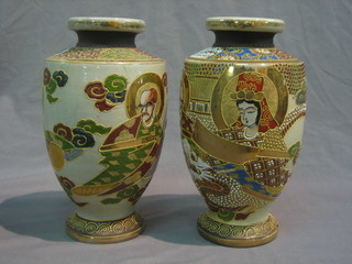 A pair of Japanese late Satsuma pottery vases decorated court figures, 1 with crack to rim 9"