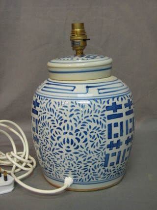 An Oriental style blue and white table lamp in the form of a ginger jar 10"