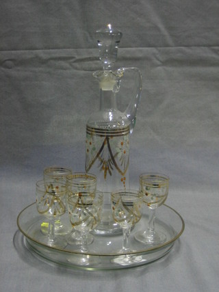 A Continental glass ewer and stopper with enamelled floral decoration, a circular tray and 6 glasses