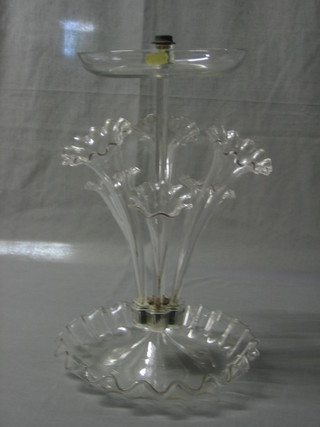 A Victorian clear glass epergne with bowl to the centre supported by 6 trumpet shaped epergnes