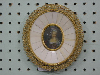 A reproduction portrait miniature of a lady, contained in an oval frame 4"