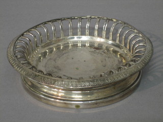 A circular Continental silver plated bottle coaster/dish 5 1/2"