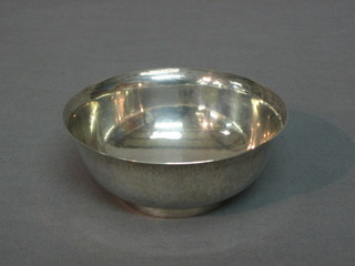 A planished silver bowl by Georg Jensen, the base marked Desin HN 925.S Denmark 527A, 4 ozs